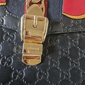 Gucci black label flame bag